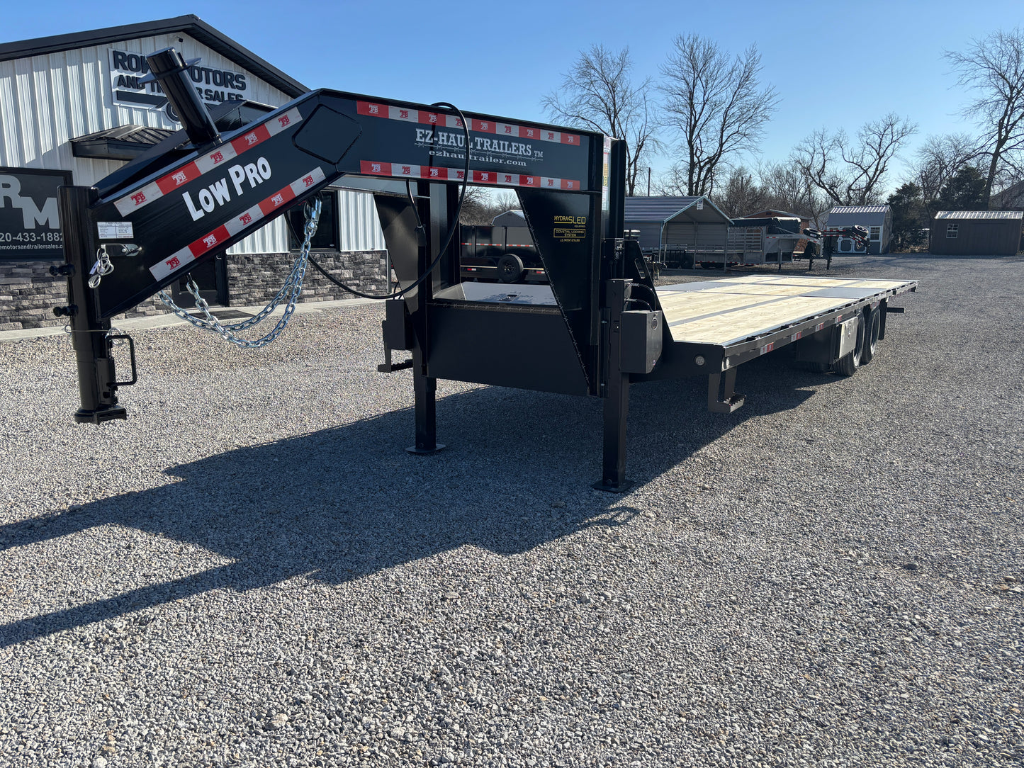 2025 EZ-Haul 32' Hydraulic Dovetail Flatbed Trailer W/ Hydraulic Jacks