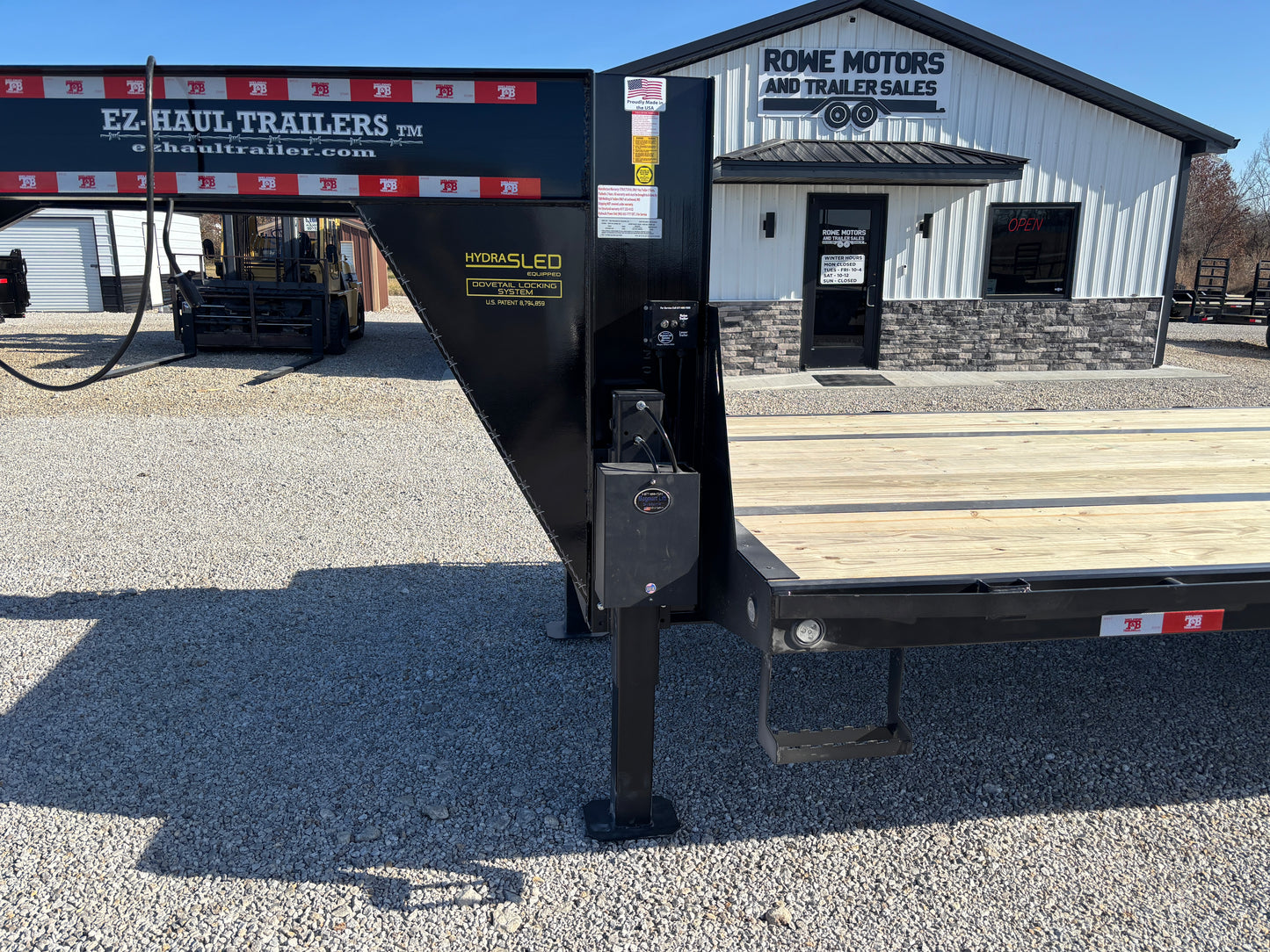 2025 EZ-Haul 32' Hydraulic Dovetail Flatbed Trailer W/ Hydraulic Jacks