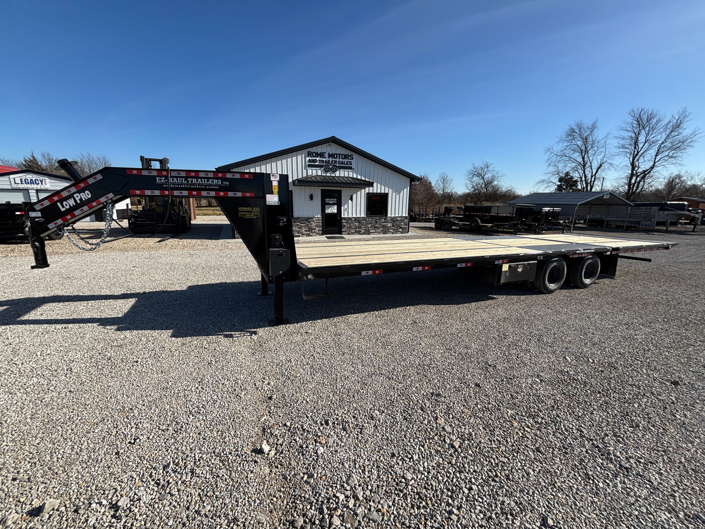 2025 EZ-Haul 32' Hydraulic Dovetail Flatbed Trailer W/ Hydraulic Jacks