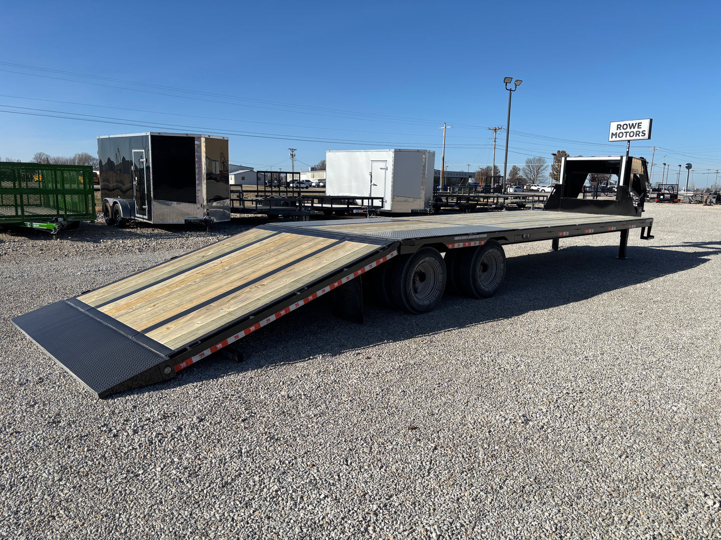 2025 EZ-Haul 32' Hydraulic Dovetail Flatbed Trailer W/ Hydraulic Jacks