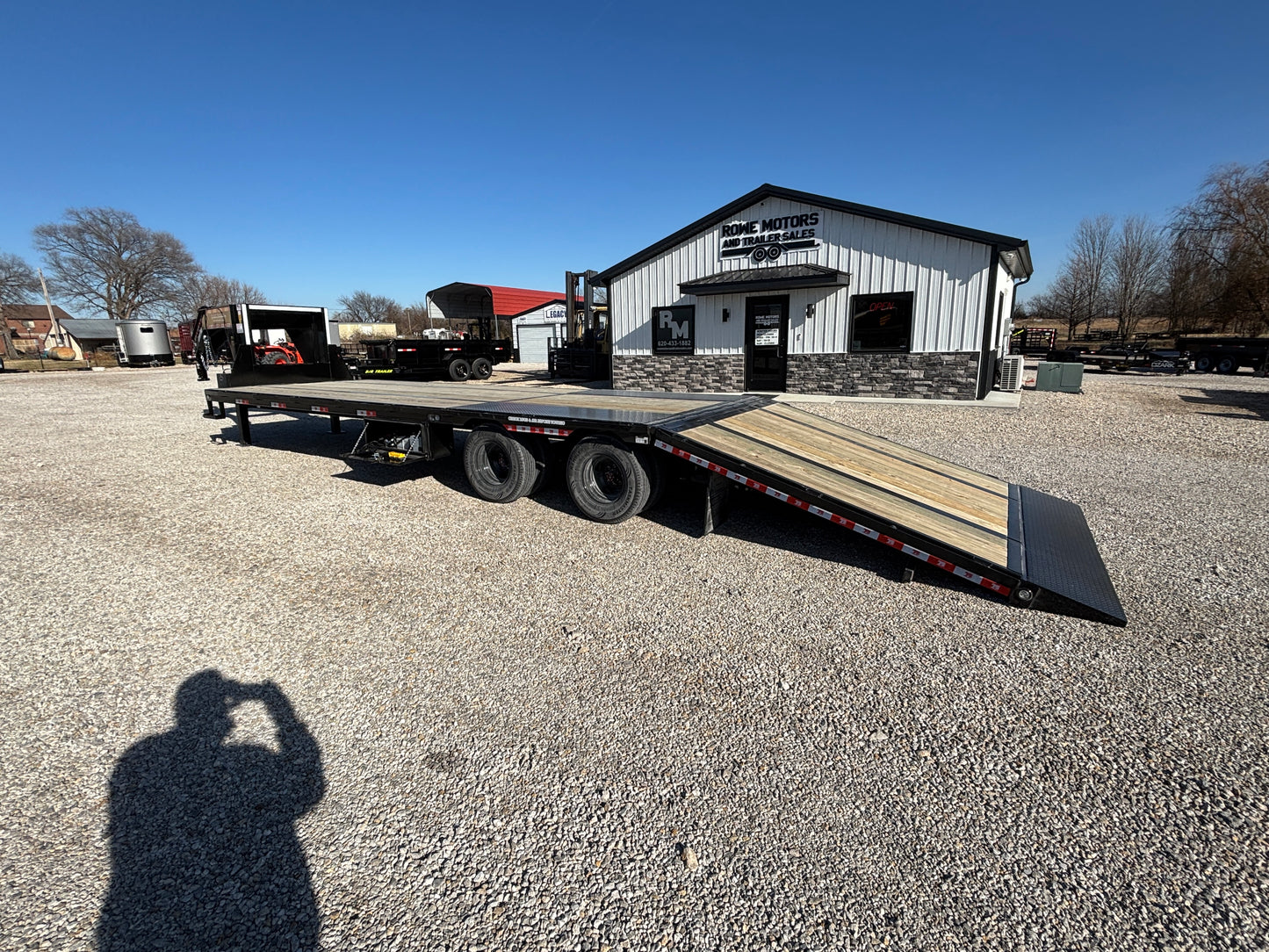 2025 EZ-Haul 32' Hydraulic Dovetail Flatbed Trailer W/ Hydraulic Jacks